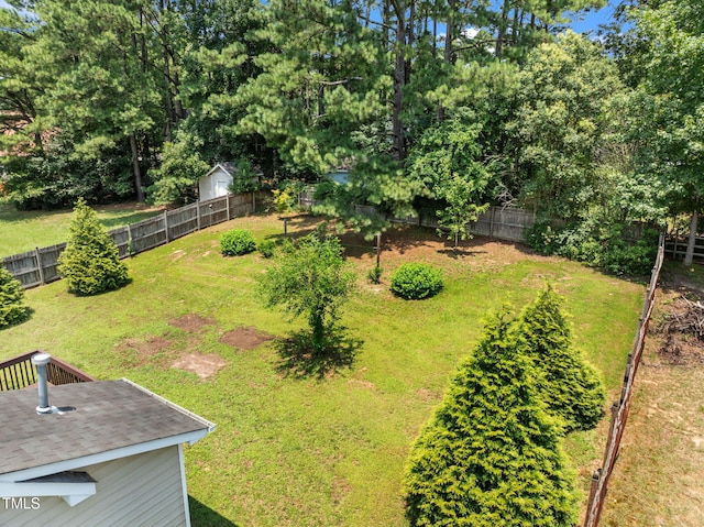 508 Hidden Cellars Dr, Holly Springs, NC 27540 - fenced backyard with view of scattered trees