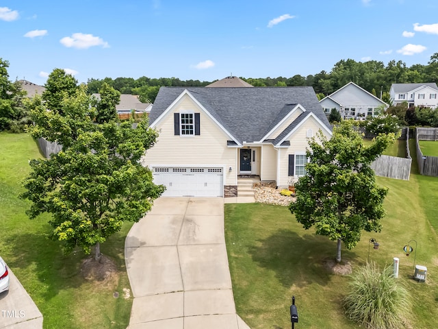 1400 Manley Ct, Fuquay Varina, NC 27526 - traditional home featuring concrete driveway, a shingled roof, an attached garage, and stone siding