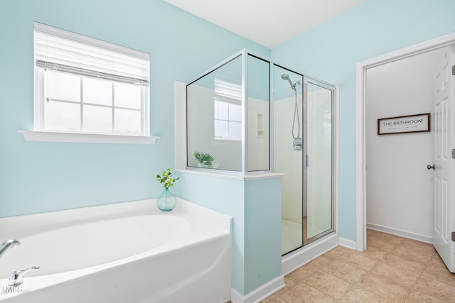 1400 Manley Ct, Fuquay Varina, NC 27526 - full bathroom featuring a garden tub and a stall shower