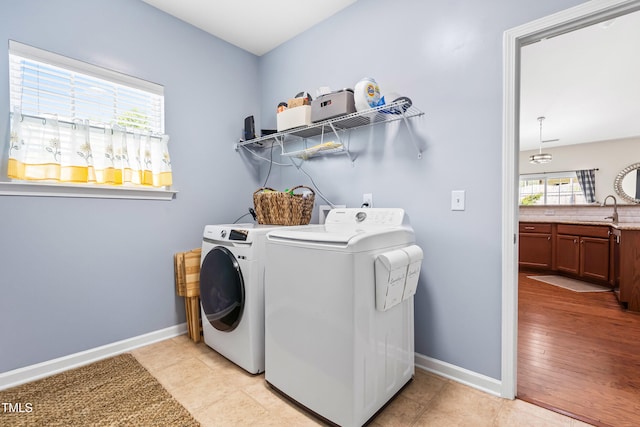 1400 Manley Ct, Fuquay Varina, NC 27526 - washroom featuring separate washer and dryer and baseboards