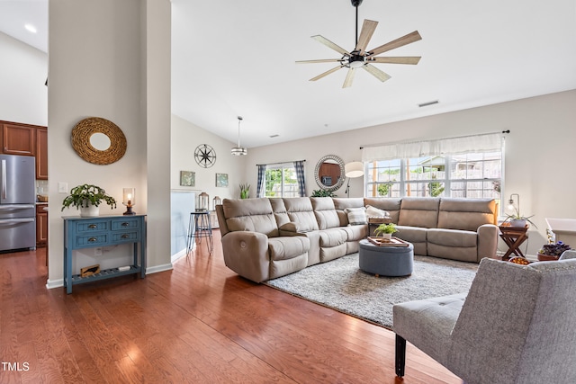 1400 Manley Ct, Fuquay Varina, NC 27526 - living area featuring high vaulted ceiling, ceiling fan, and dark wood-style floors