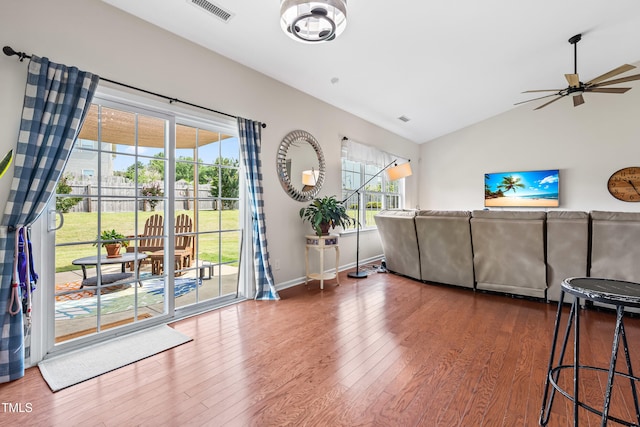 1400 Manley Ct, Fuquay Varina, NC 27526 - living room featuring wood finished floors, lofted ceiling, and a ceiling fan