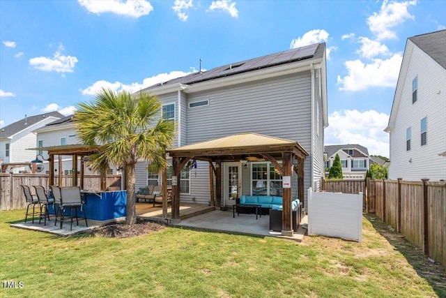 1161 Tulip Poplar Rd, Fuquay Varina, NC 27526 - back of house with an outdoor living space, a gazebo, solar panels, and a patio