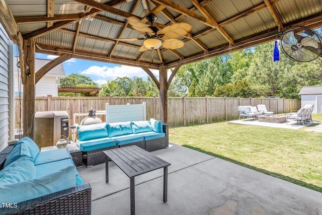 1161 Tulip Poplar Rd, Fuquay Varina, NC 27526 - view of patio featuring an outdoor living space with a fire pit, a ceiling fan, and a gazebo