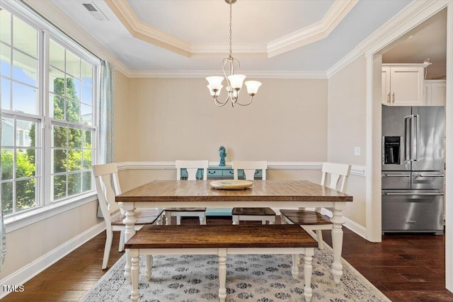 1161 Tulip Poplar Rd, Fuquay Varina, NC 27526 - dining area featuring a raised ceiling, dark wood finished floors, a chandelier, ornamental molding, and baseboards