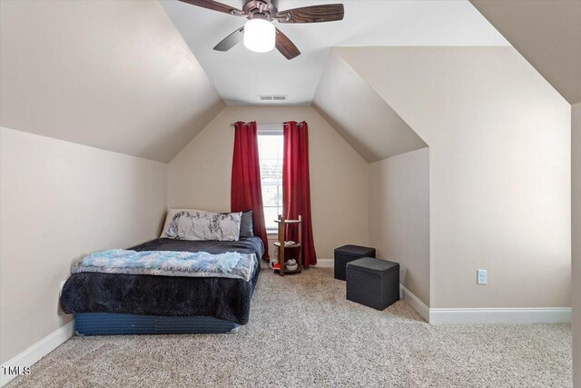 1161 Tulip Poplar Rd, Fuquay Varina, NC 27526 - bedroom with carpet, vaulted ceiling, baseboards, and ceiling fan