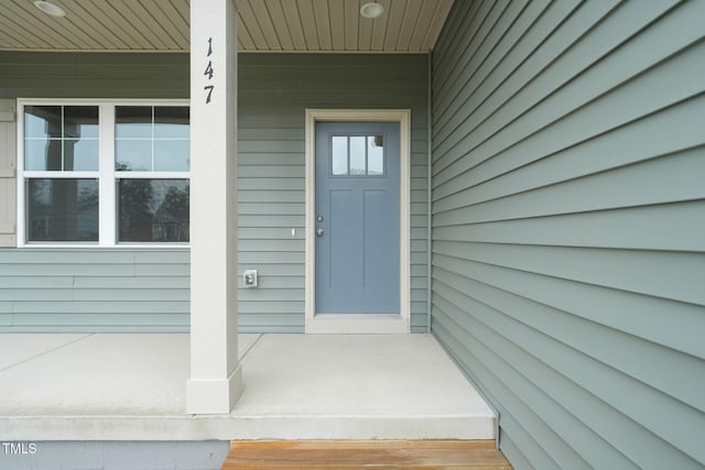 147 Harmony Trl, Broadway, NC 27505 - view of exterior entry with a porch