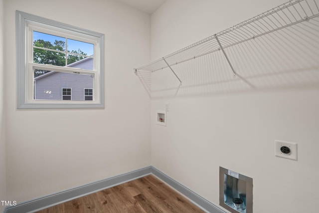 147 Harmony Trl, Broadway, NC 27505 - washroom with baseboards, wood finished floors, electric dryer hookup, and washer hookup