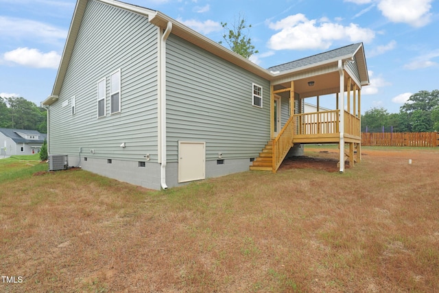 147 Harmony Trl, Broadway, NC 27505 - back of property with crawl space, stairway, central AC, and a deck