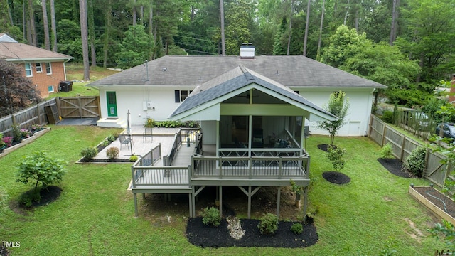 3934 Hope Valley Rd, Durham, NC 27707 - rear view of property featuring a deck, a shingled roof, a chimney, and a gate