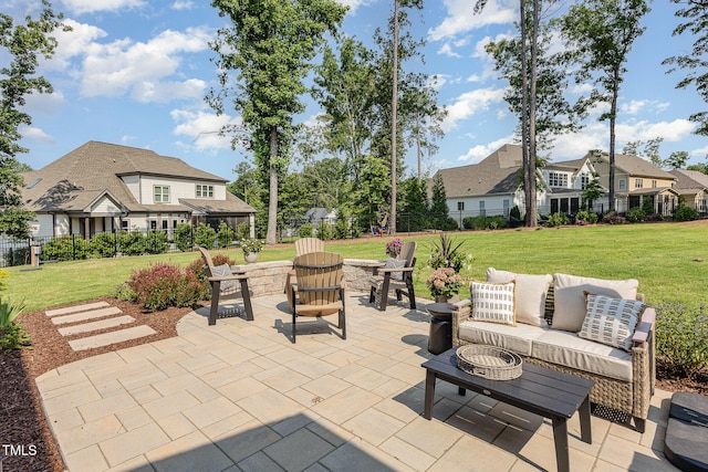 2328 Sanctuary Dr, Raleigh, NC 27606 - view of patio / terrace with an outdoor living space with a fire pit and a residential view