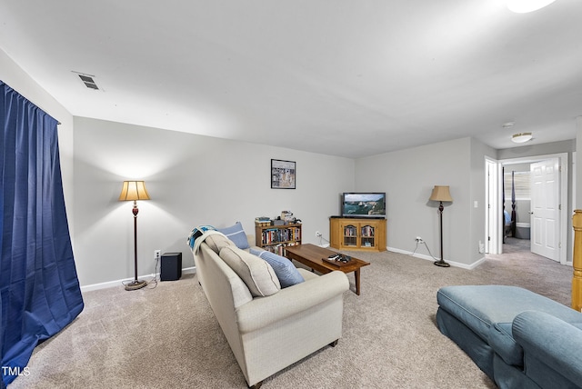 2910 Barrymore St Unit 100, Raleigh, NC 27603 - living room with carpet floors and baseboards
