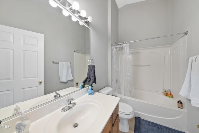 2910 Barrymore St Unit 100, Raleigh, NC 27603 - full bathroom featuring vanity, toilet, shower / bath combo with shower curtain, and tile patterned floors