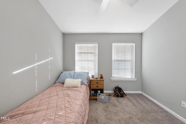 2910 Barrymore St Unit 100, Raleigh, NC 27603 - bedroom featuring carpet, baseboards, and a ceiling fan