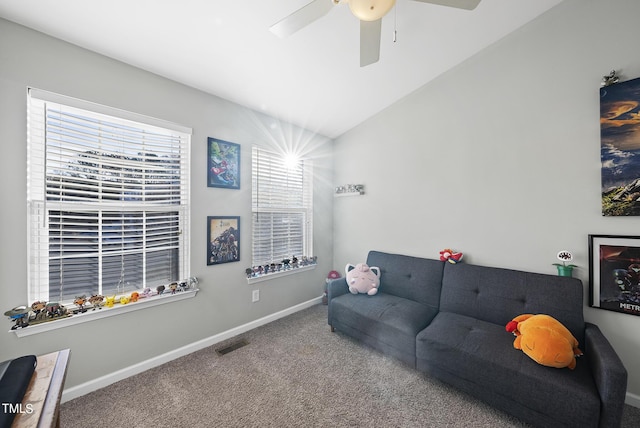 2910 Barrymore St Unit 100, Raleigh, NC 27603 - living room with carpet, vaulted ceiling, ceiling fan, and baseboards
