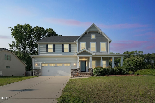20 Sugarpine Trl, Clayton, NC 27520 - view of front of house featuring driveway, a garage, a lawn, and a porch