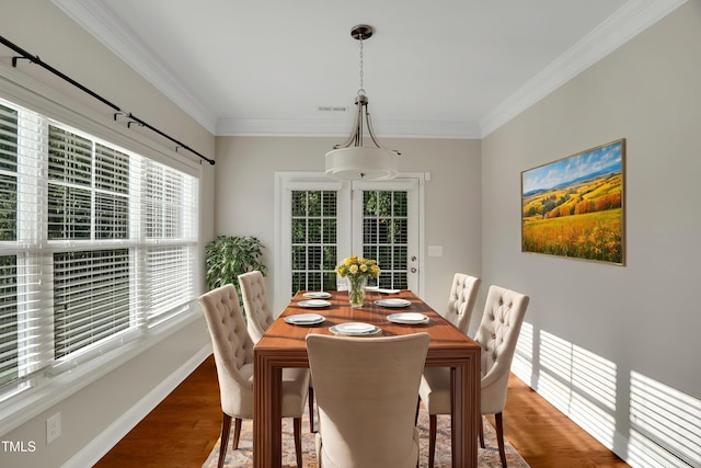 20 Sugarpine Trl, Clayton, NC 27520 - dining space featuring ornamental molding, wood finished floors, and baseboards