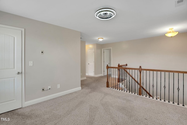 20 Sugarpine Trl, Clayton, NC 27520 - hall featuring an upstairs landing, carpet, and baseboards