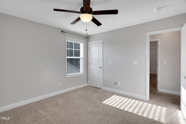 20 Sugarpine Trl, Clayton, NC 27520 - unfurnished bedroom with carpet, baseboards, a ceiling fan, and a closet