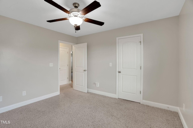 20 Sugarpine Trl, Clayton, NC 27520 - unfurnished bedroom with baseboards, light colored carpet, and a ceiling fan