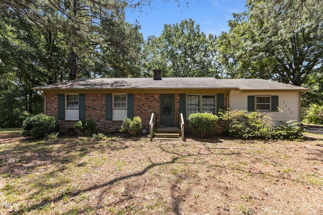 4038 Redwood Rd, Durham, NC 27704 - ranch-style house featuring brick siding and a chimney
