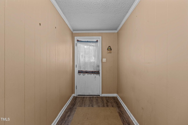 4038 Redwood Rd, Durham, NC 27704 - entryway with dark wood-style floors, a textured ceiling, and ornamental molding