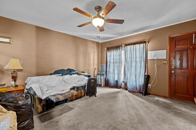 4038 Redwood Rd, Durham, NC 27704 - bedroom featuring carpet, ceiling fan, and a textured ceiling