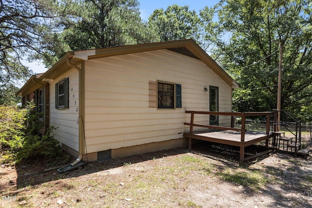 4038 Redwood Rd, Durham, NC 27704 - view of property exterior featuring a wooden deck