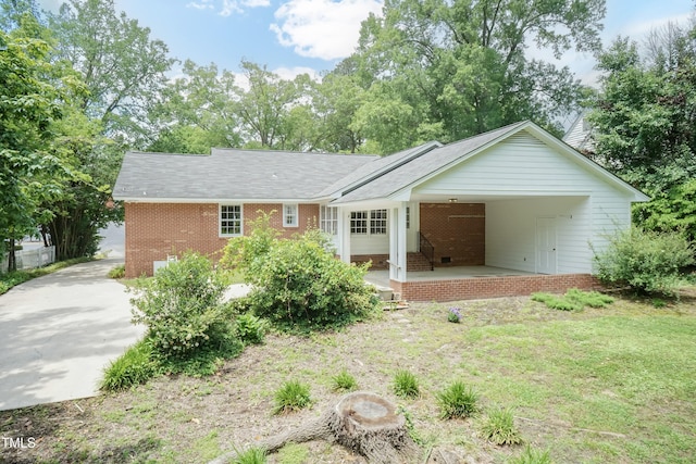 303 Spring St, Louisburg, NC 27549 - single story home featuring brick siding and a front yard