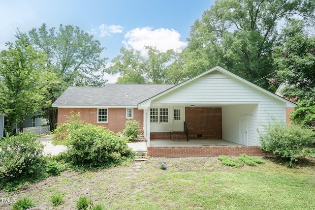 303 Spring St, Louisburg, NC 27549 - view of front of property featuring brick siding, a front yard, and entry steps