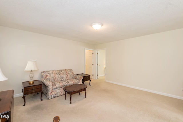 303 Spring St, Louisburg, NC 27549 - living area featuring light carpet and baseboards
