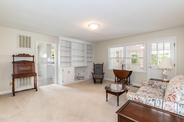 303 Spring St, Louisburg, NC 27549 - living room with light carpet and baseboards