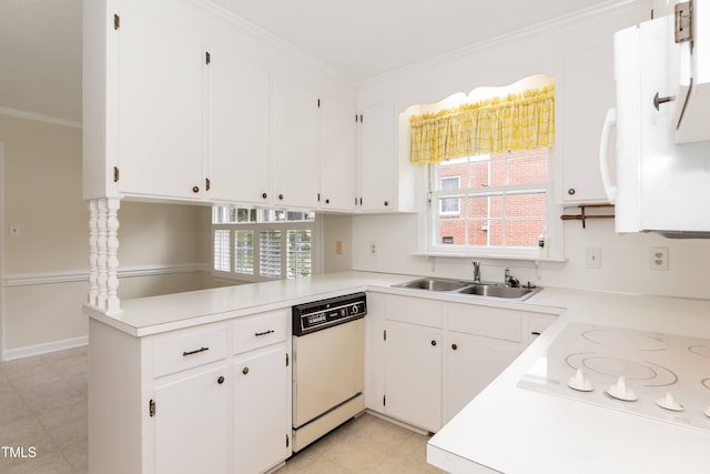 303 Spring St, Louisburg, NC 27549 - kitchen with white appliances, a sink, healthy amount of natural light, ornamental molding, and light countertops