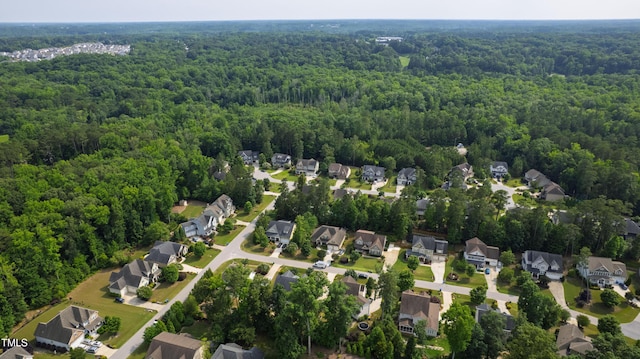 2661 Silver Bend Dr, Apex, NC 27539 - aerial view of property's location featuring a heavily wooded area and nearby suburban area
