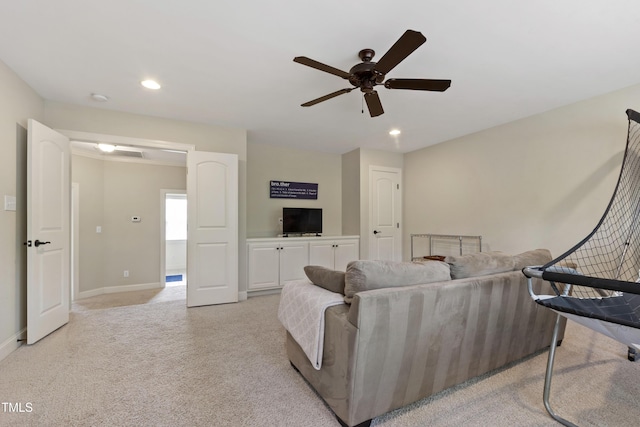 2661 Silver Bend Dr, Apex, NC 27539 - living room with ceiling fan, light colored carpet, recessed lighting, and baseboards