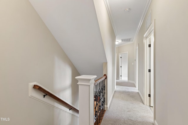 2661 Silver Bend Dr, Apex, NC 27539 - hallway featuring an upstairs landing, carpet, attic access, crown molding, and baseboards