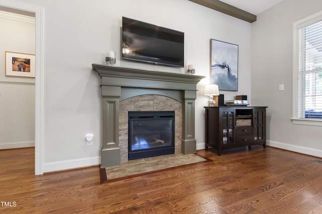 2661 Silver Bend Dr, Apex, NC 27539 - living room featuring a tile fireplace, wood finished floors, and baseboards