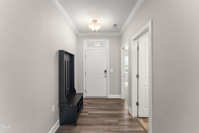409 Rhamkatte Rd, Holly Springs, NC 27540 - entrance foyer featuring crown molding, wood finished floors, and baseboards
