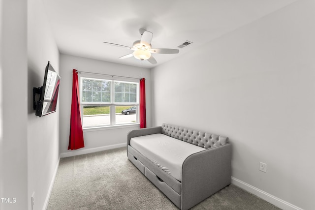 409 Rhamkatte Rd, Holly Springs, NC 27540 - living area with a ceiling fan, baseboards, and carpet floors