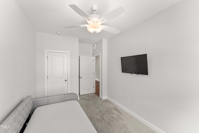 409 Rhamkatte Rd, Holly Springs, NC 27540 - bedroom featuring carpet flooring, baseboards, and a ceiling fan