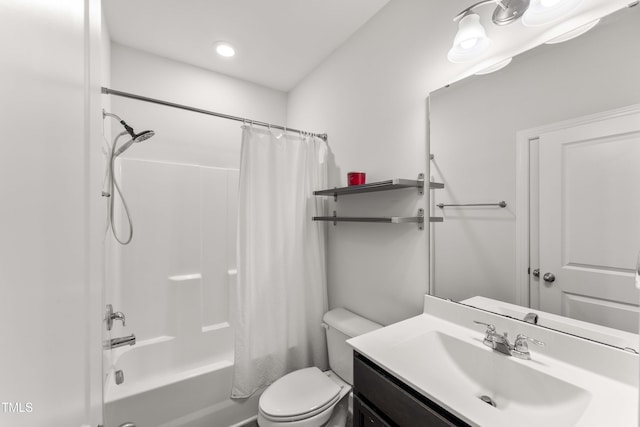 409 Rhamkatte Rd, Holly Springs, NC 27540 - full bathroom featuring toilet, vanity, shower / bath combo, and recessed lighting