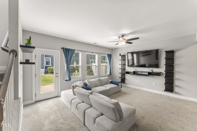 409 Rhamkatte Rd, Holly Springs, NC 27540 - carpeted living room with ceiling fan and baseboards