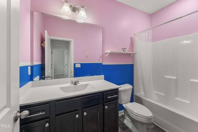 409 Rhamkatte Rd, Holly Springs, NC 27540 - full bath featuring toilet, vanity, shower / bath combo, and tile patterned floors