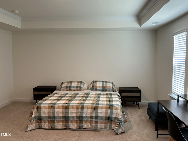 1116 Sidney Creek Dr Unit 1116, Zebulon, NC 27597 - bedroom with ornamental molding, carpet floors, a tray ceiling, and baseboards