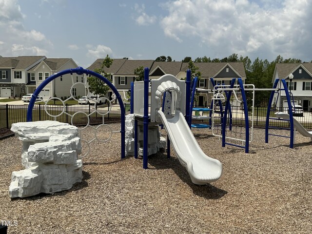 1116 Sidney Creek Dr Unit 1116, Zebulon, NC 27597 - communal playground featuring a residential view
