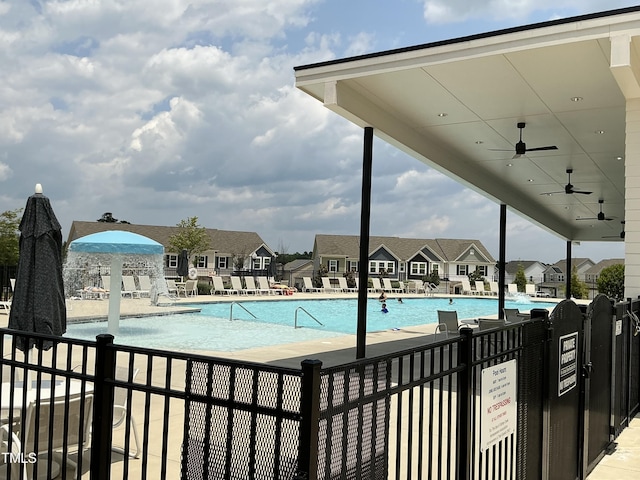 1116 Sidney Creek Dr Unit 1116, Zebulon, NC 27597 - community pool with ceiling fan and a patio