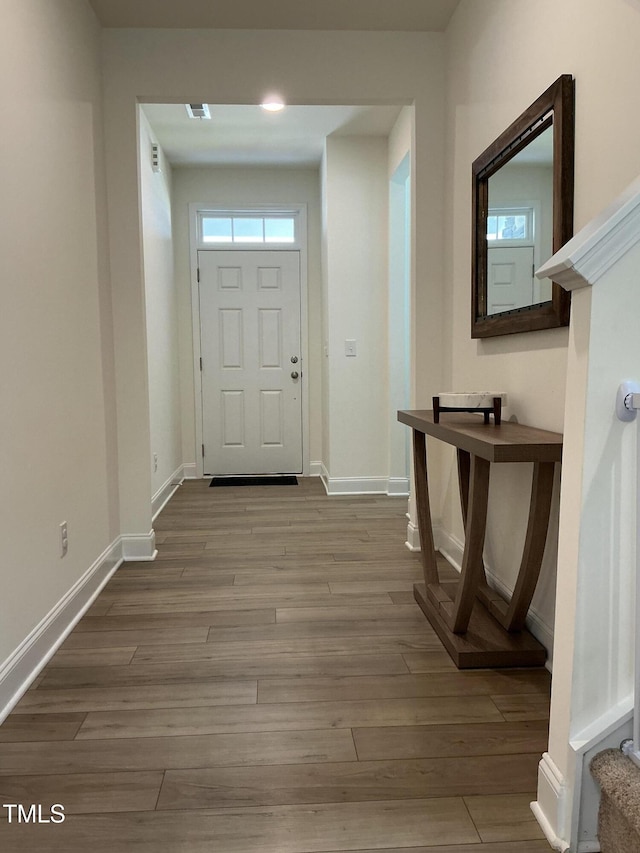 1116 Sidney Creek Dr Unit 1116, Zebulon, NC 27597 - entrance foyer with baseboards and wood finished floors
