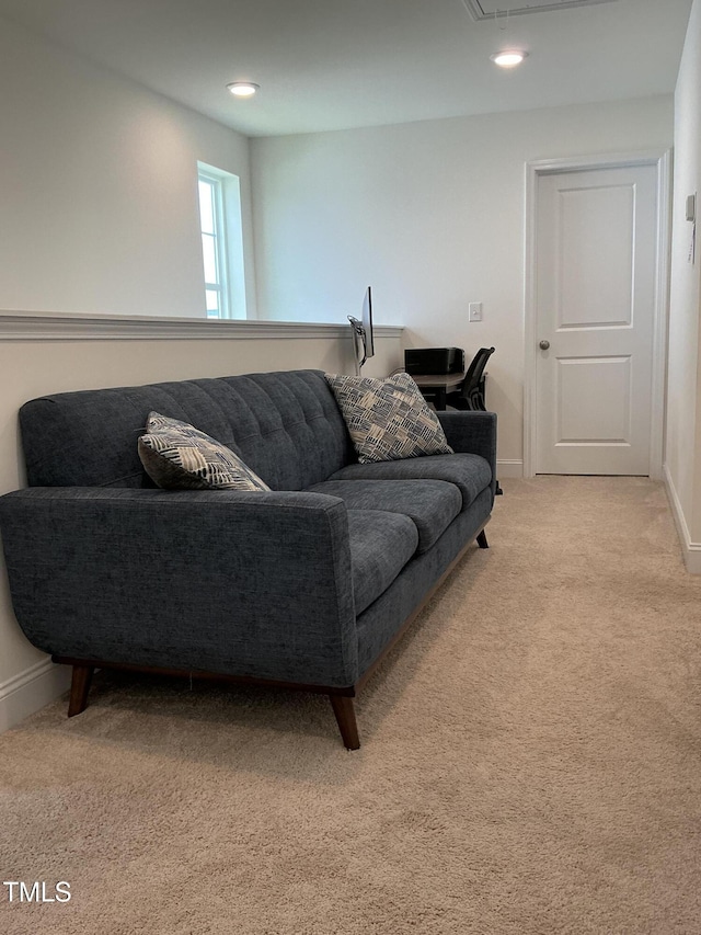 1116 Sidney Creek Dr Unit 1116, Zebulon, NC 27597 - living room with light carpet, baseboards, recessed lighting, and attic access