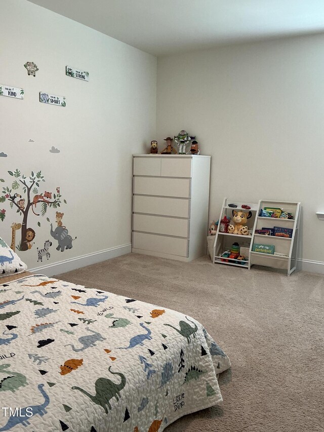 1116 Sidney Creek Dr Unit 1116, Zebulon, NC 27597 - carpeted bedroom with baseboards