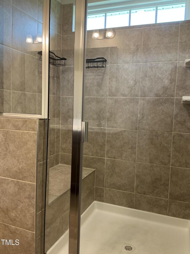 1116 Sidney Creek Dr Unit 1116, Zebulon, NC 27597 - bathroom featuring a shower stall